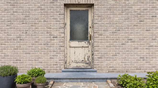 BEFORE photo — old single-glazed wood door, single-point lock